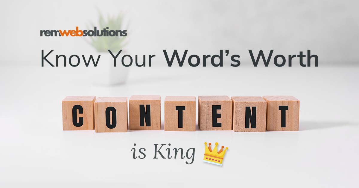 Block letters on a table that say content is king
